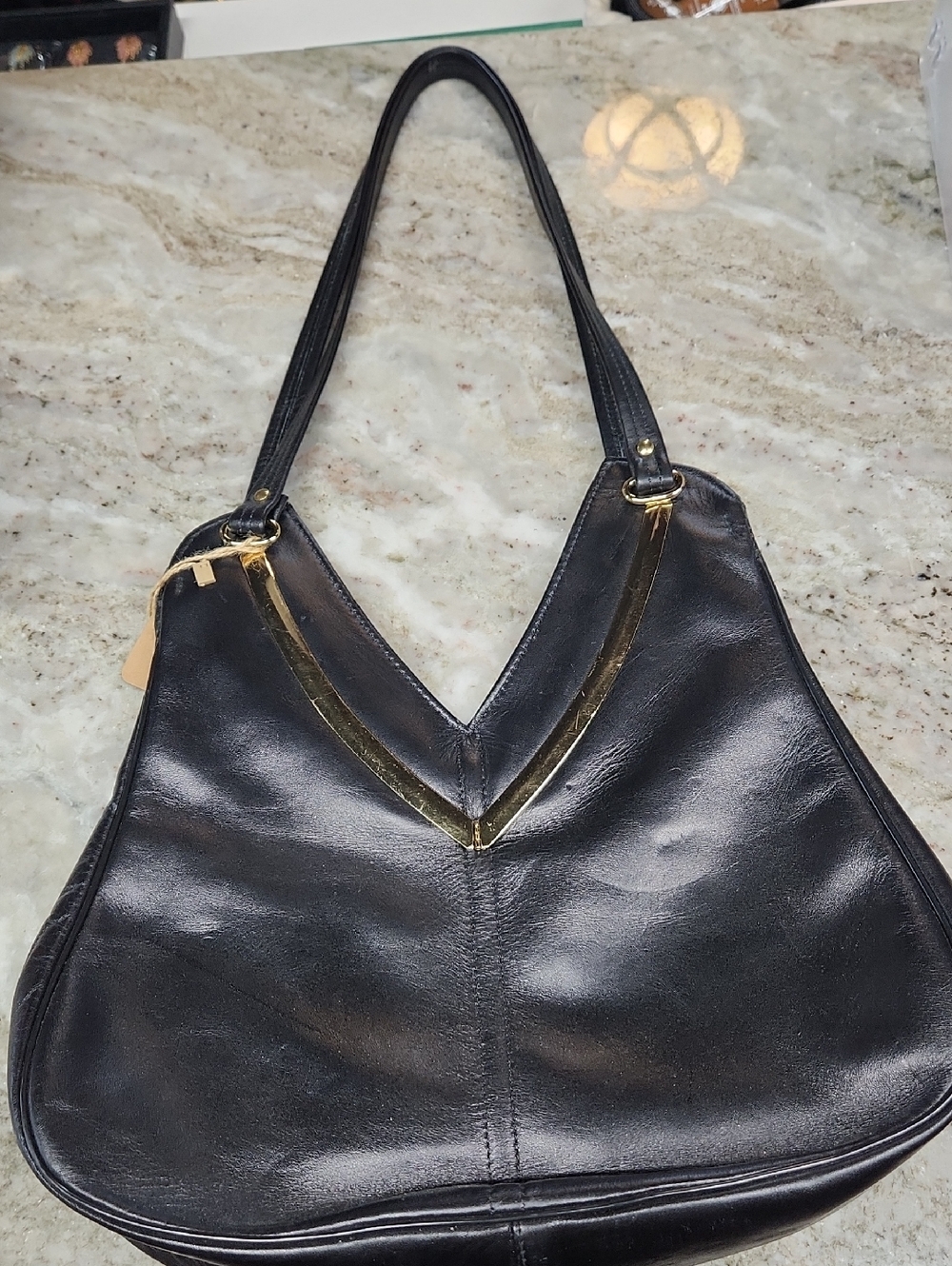 Black Leather Shoulder Bag with Gold V Accent